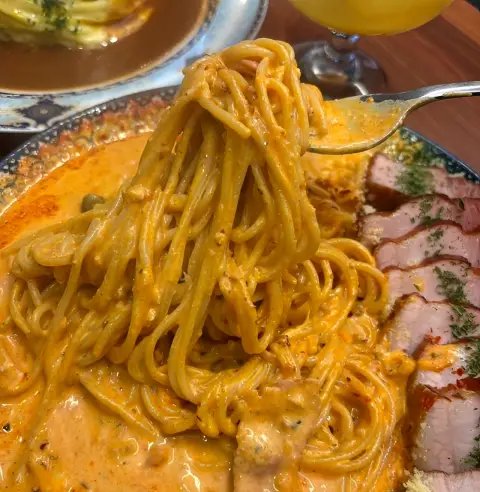 Creamy rosé pasta with sliced pork belly from the Ikseon Chwihyang menu