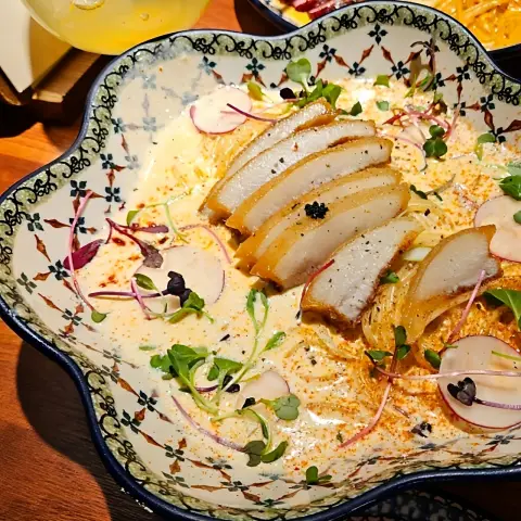 Creamy rosé pasta served in a floral ceramic bowl at Ikseon Chwihyang