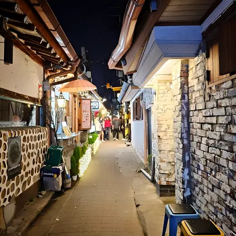Night alley in ikseondong hanok village with warm lights