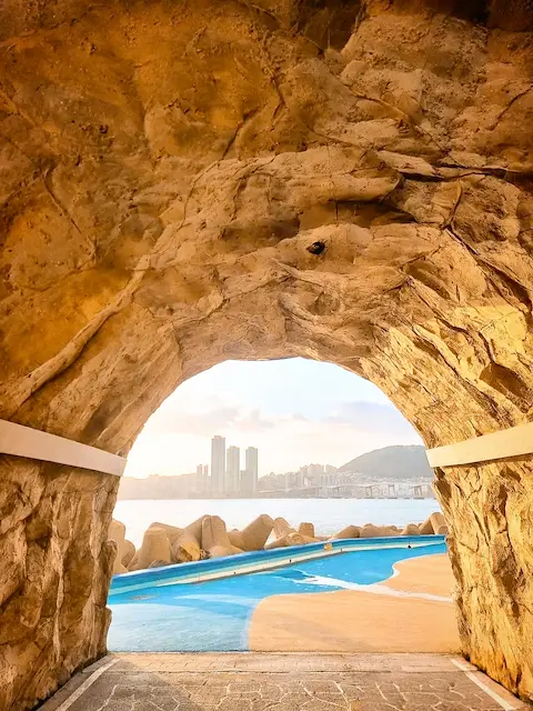 Tunnel framing Busan skyline from Yeongdo