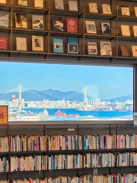 Bookstore window with Busan Harbor Bridge