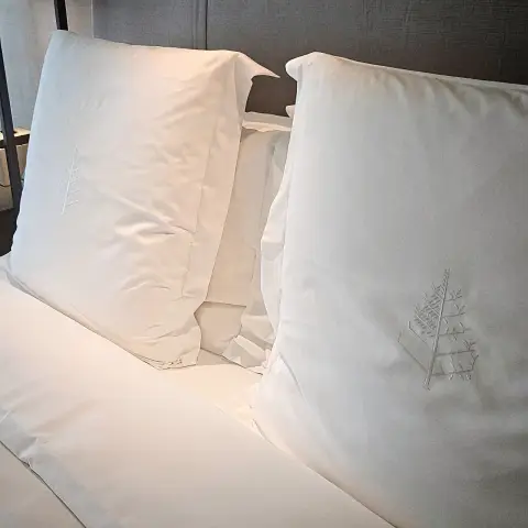 Embroidered pillows with Four Seasons logo