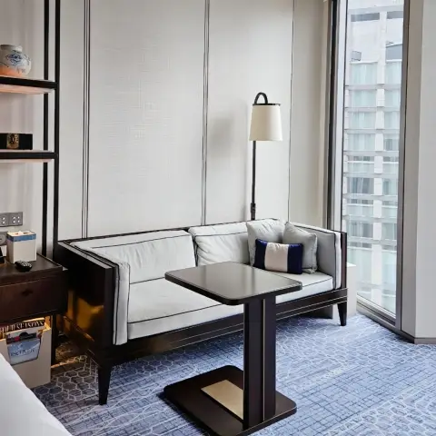 Corner sofa and side table in Premier Room