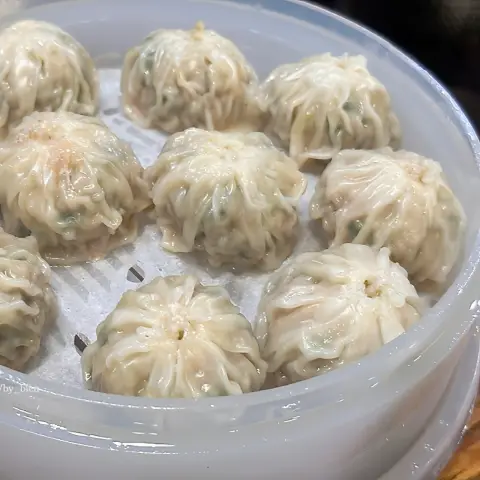 Steamed mandu in serving container at Myeongdong Kyoja