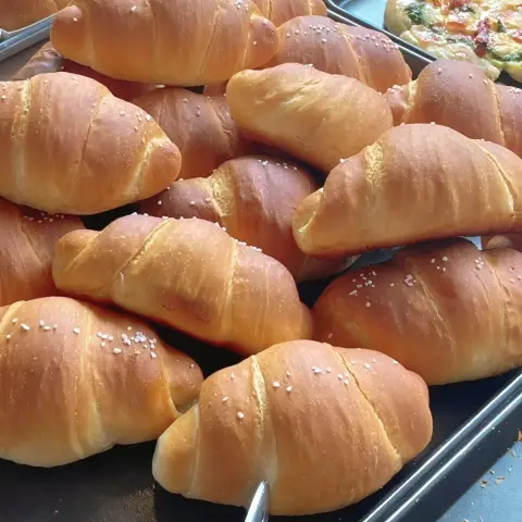 Salt bread with soft golden crust on the cafe onion anguk menu