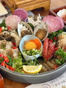 Mipojip seafood platter with abalone, crab, and octopus
