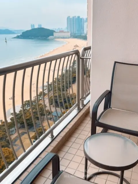 balcony chairs with view of haeundae beach