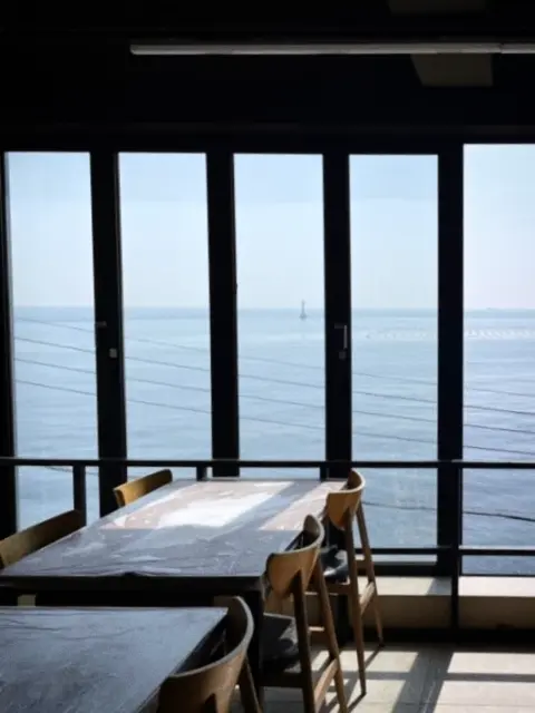 Ocean view seating at a Cheongsapo restaurant
