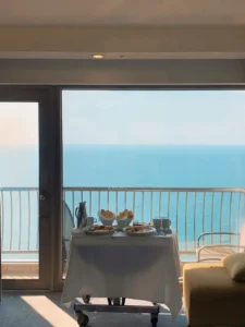 room service breakfast setup facing the ocean