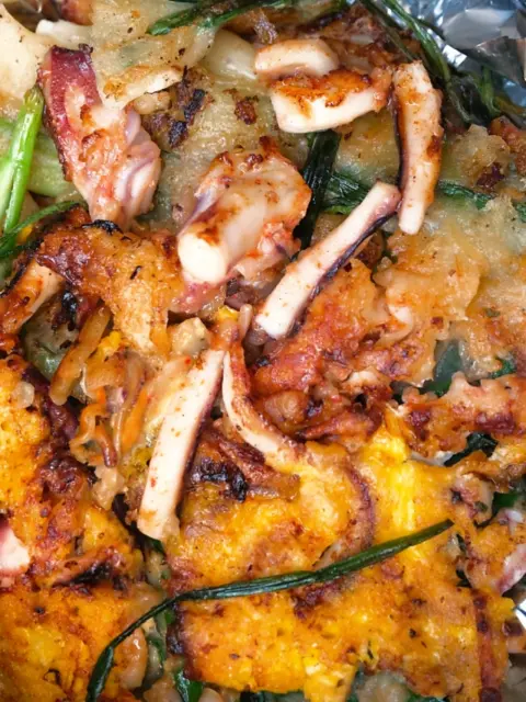 Close-up of squid-packed seafood pancake
