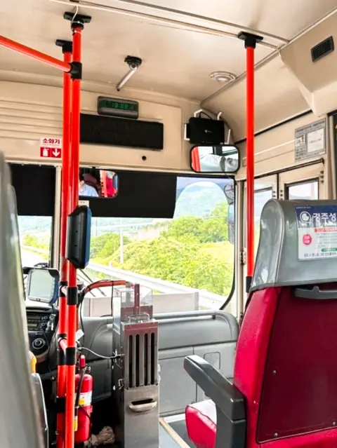 Gyeongju local bus interior with countryside view