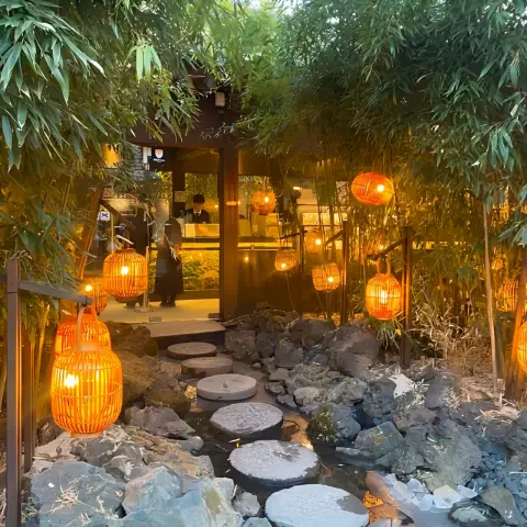 cheongsudang stone pathway with lanterns at dusk