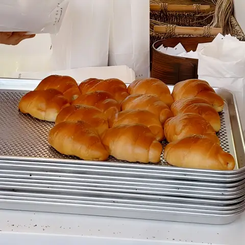 Freshly baked Jayeondo Salt Bread on a tray at Ikseon-dong