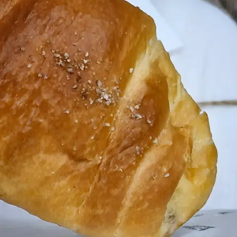Sea salt sprinkled on the crust of Jayeondo Salt Bread