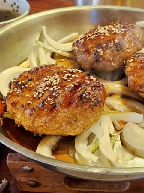Tteokgalbi grilled short rib patties on a Jeonju day trip