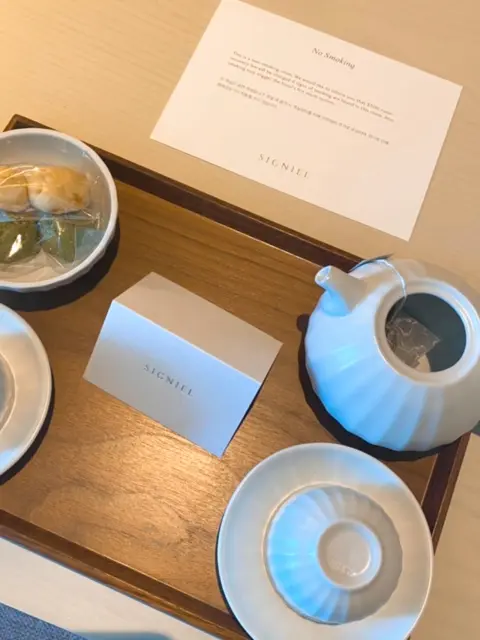 Welcome tea set at Signiel Busan with traditional snacks and elegant ceramics