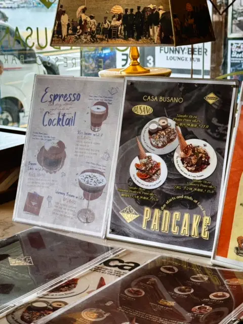 Espresso cocktails and pancakes on display at Casa Busano Gwangan, showcasing the creative flavors the cafe is known for.