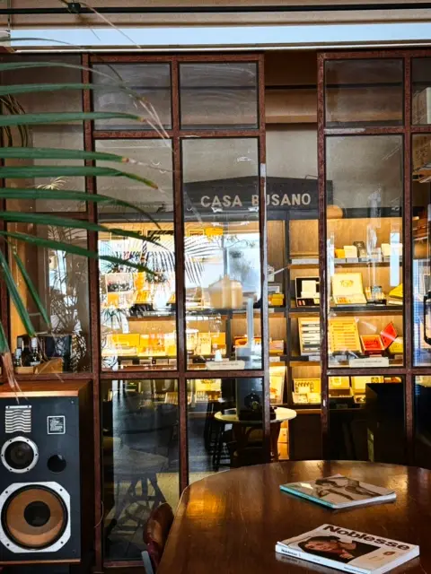 Warm lighting and wood interiors set the tone at Casa Busano Gwangan, a space where style meets comfort.