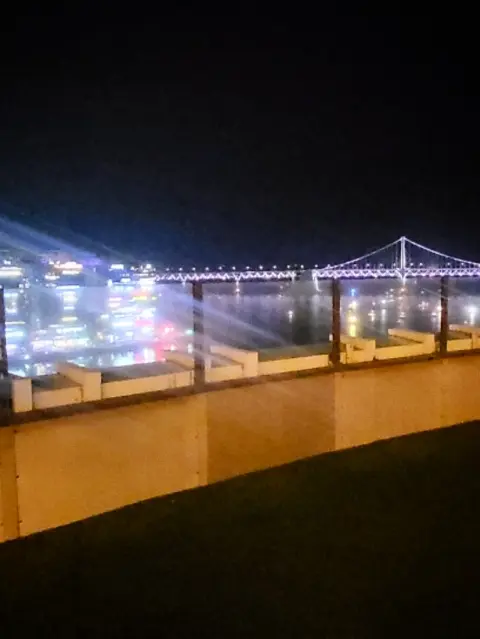 Night view of Gwangandaegyo Bridge from the rooftop of Kent Hotel Gwangalli by Kensington