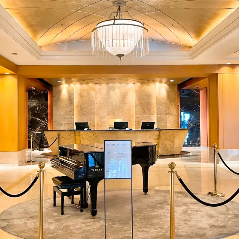 Reception area with grand piano at Lotte Hotel Seoul