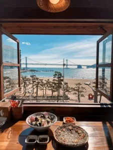 Open window view at Nasari Sigdang with lunch set and Gwangandaegyo Bridge