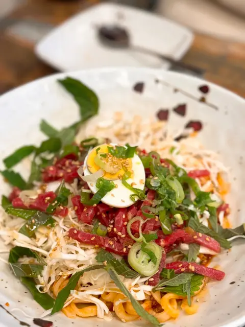 Beef tartare yukhoe bibim kalguksu served at Nasari Sigdang