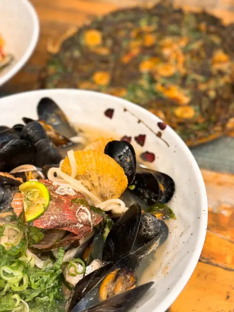 Seafood king kalguksu bowl at Nasari Sigdang with assorted shellfish