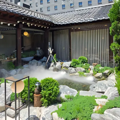 Bamboo mist garden surrounded by hanok structures