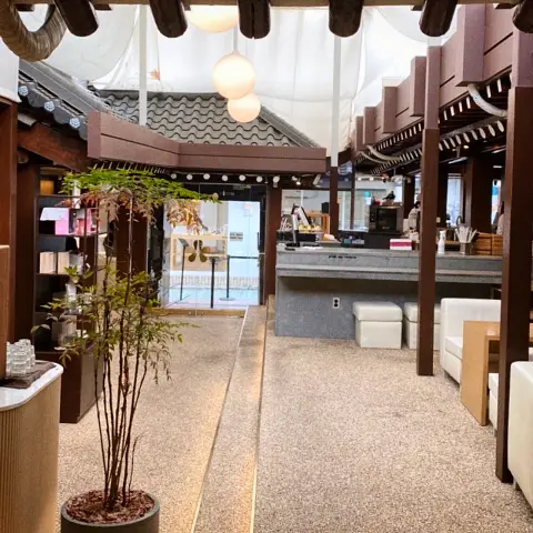 Cafe onhwa ikseon entrance hall with indoor hanok path and modern lighting