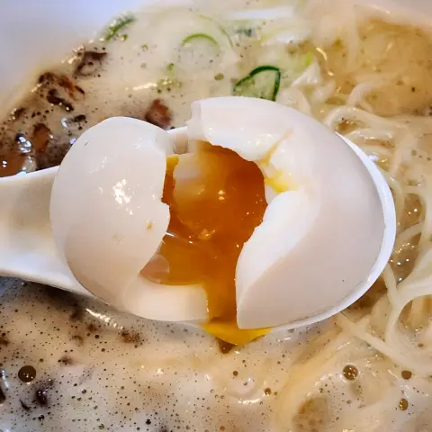 Perfectly soft-boiled egg at Oreno Ramen Insa with a rich, runny yolk