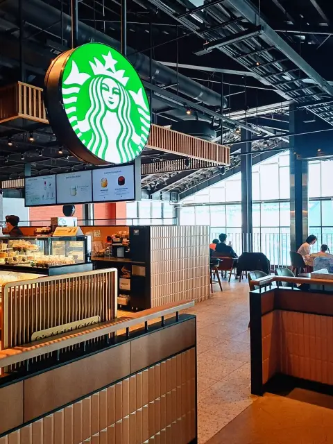 Millac The Market Starbucks with ocean-view seating area