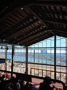 Millac The Market panoramic window showing harbor and ocean beyond