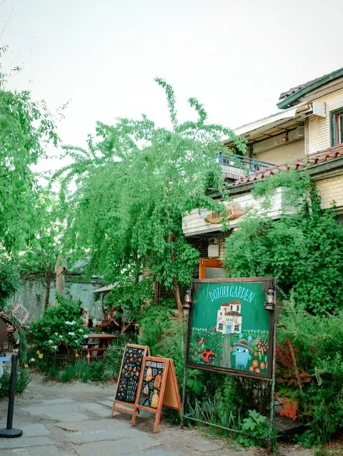 Dotori Garden Anguk entrance with lush greenery and whimsical vibe