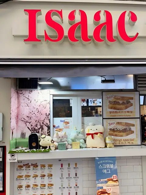 Isaac Toast Myeongdong storefront near the cathedral, cute plush display and ordering window
