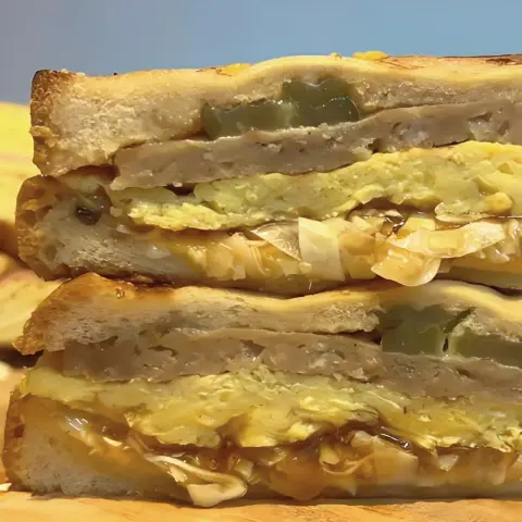 Isaac Toast Myeongdong Grilled Bulgogi toast cross-section with juicy patty and egg