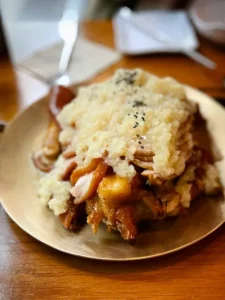 Garlic-covered jokbal served at Myth Jokbal Hongdae