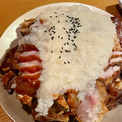 Garlic jokbal plate at Myth Jokbal Hongdae topped with sesame seeds