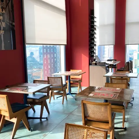 Dining space at The Place restaurant in L7 Hongdae Review