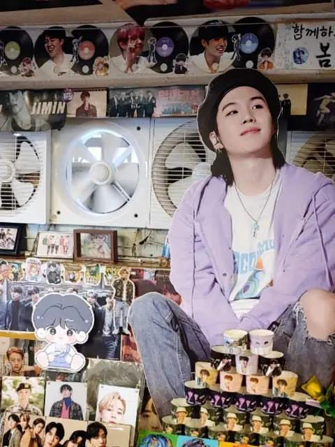 BTS-themed interior at Yoojung Sikdang filled with fan photos and decorations