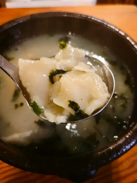 Insadong Sujebi in a hot earthen pot with chewy dough flakes